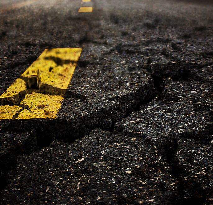 Close up of cracked road