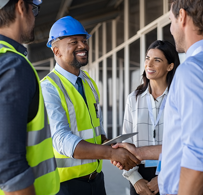 Team members shaking hands